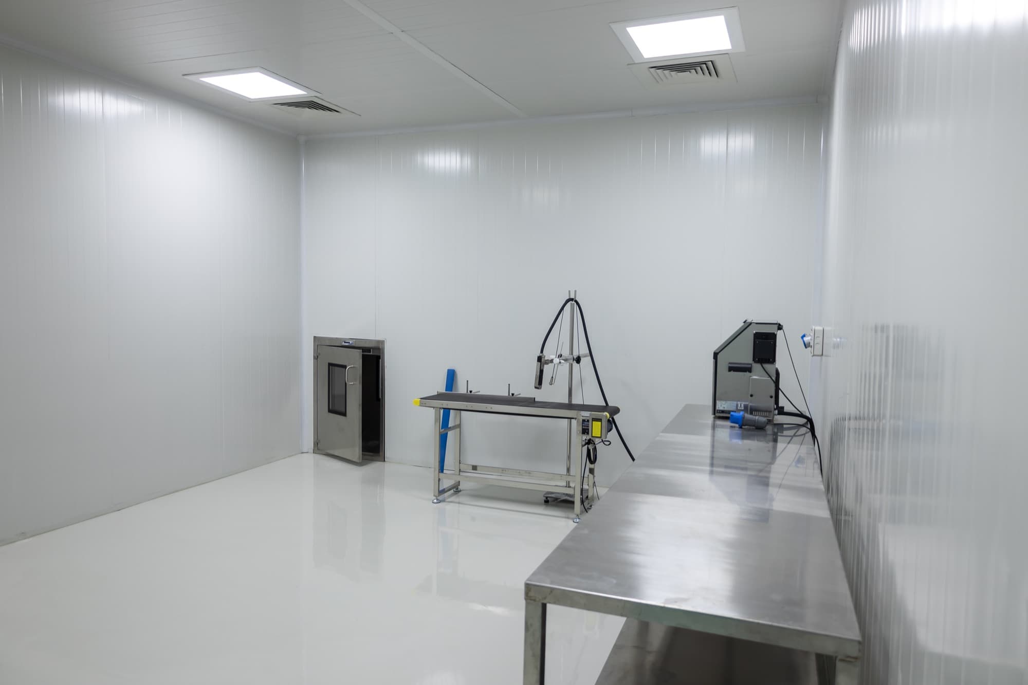 Filling room with stainless-steel work tables