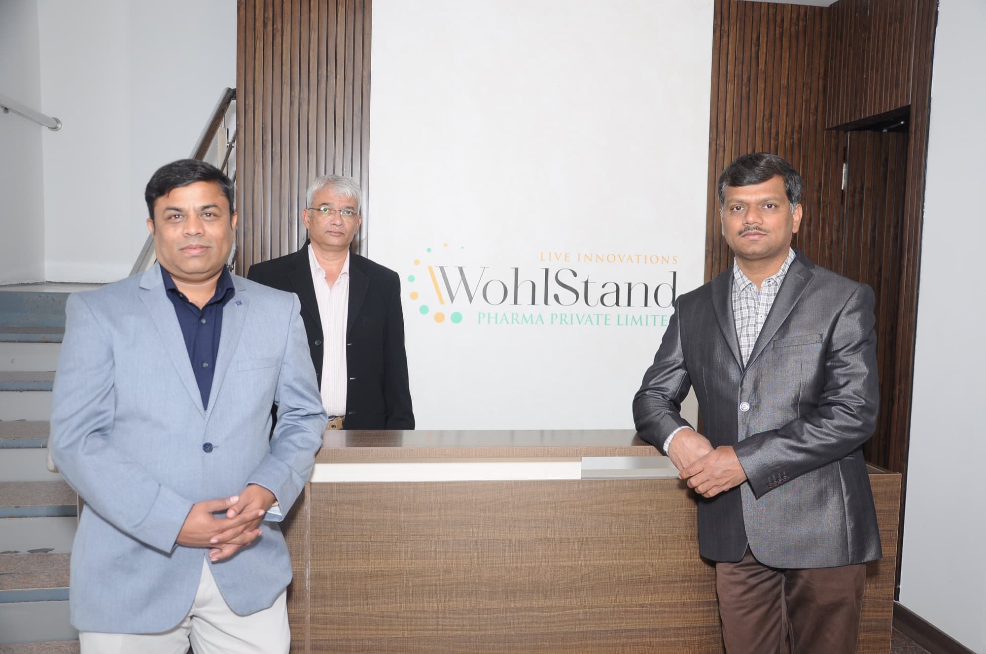 WohlStand Pharma leadership at the reception desk